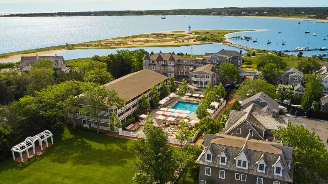 An aerial view of the Harbor View Hotel with Edgartown Harbor and Chappaquiddick Island in the background.