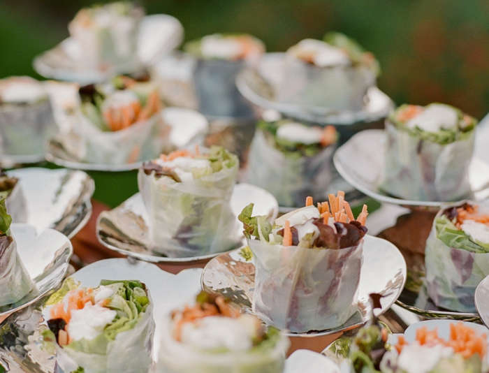 Spring roll appetizers on a tray.