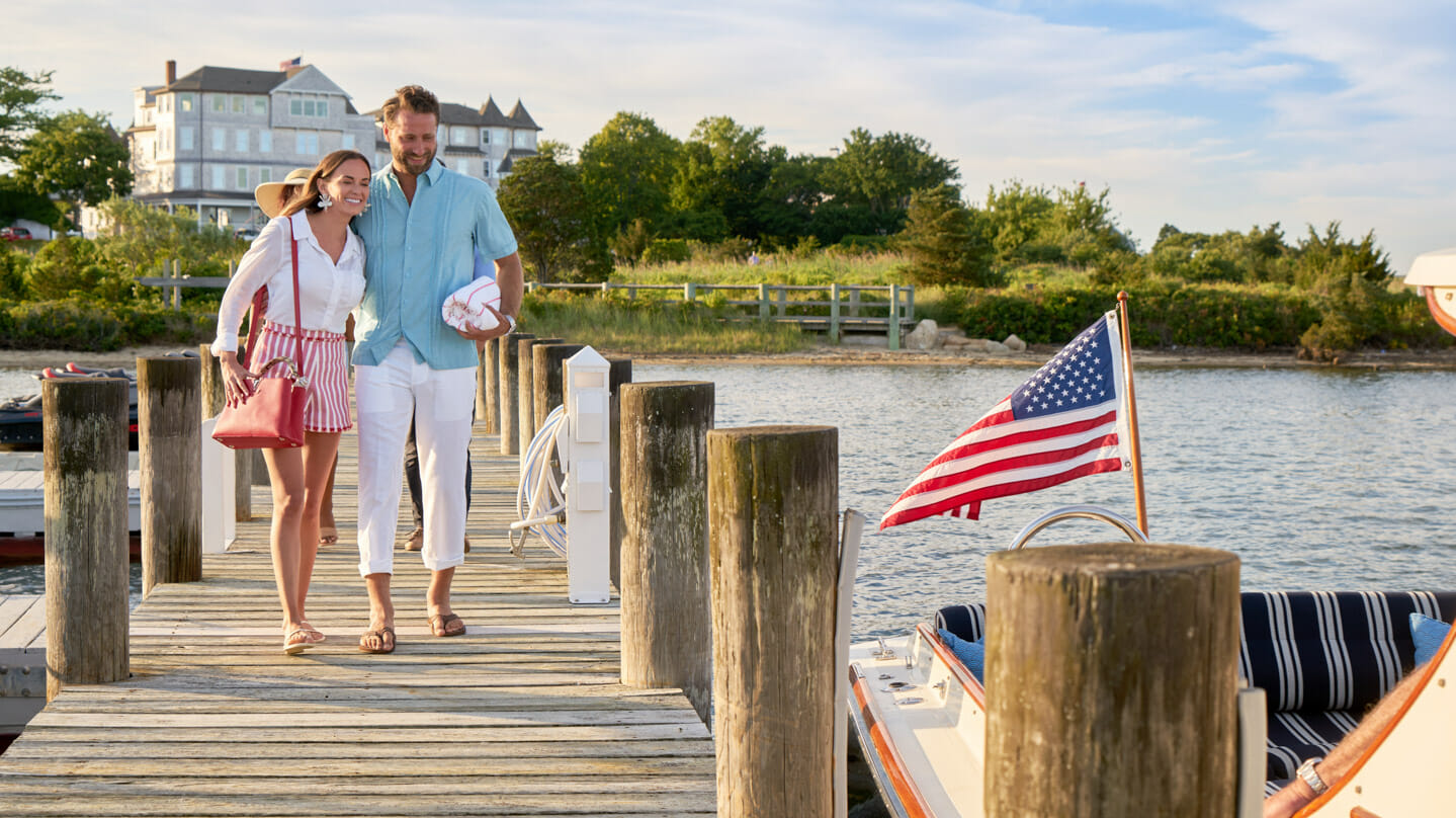 Couple walking on the dock together