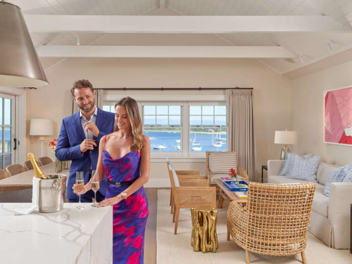 Couple standing in the open concept kitchen living room