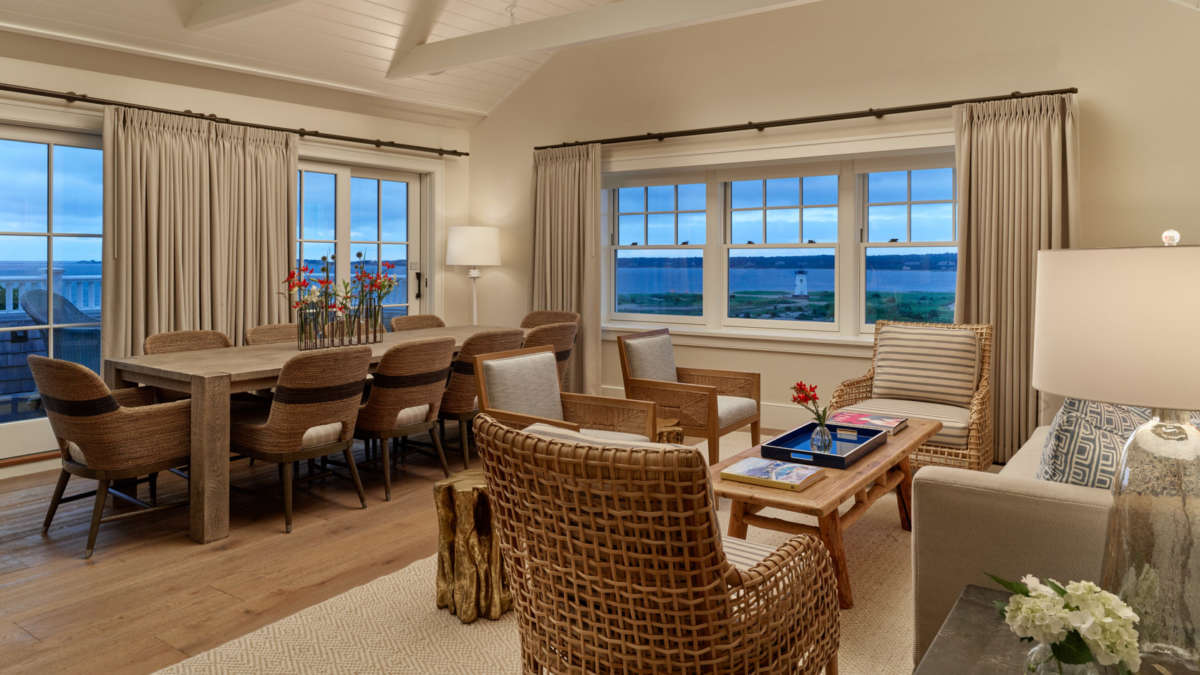 Open concept living and dining room in the Skyhouse Suite at Harbor View Hotel.