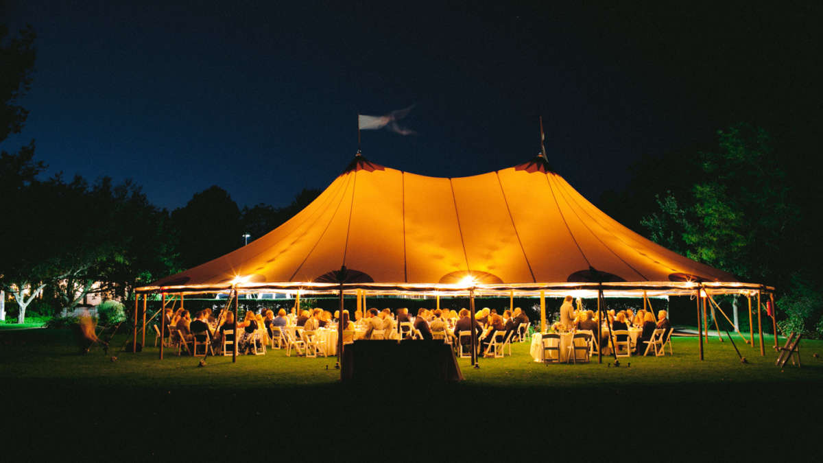 Wedding Reception tent at Harbor View Hotel at night.