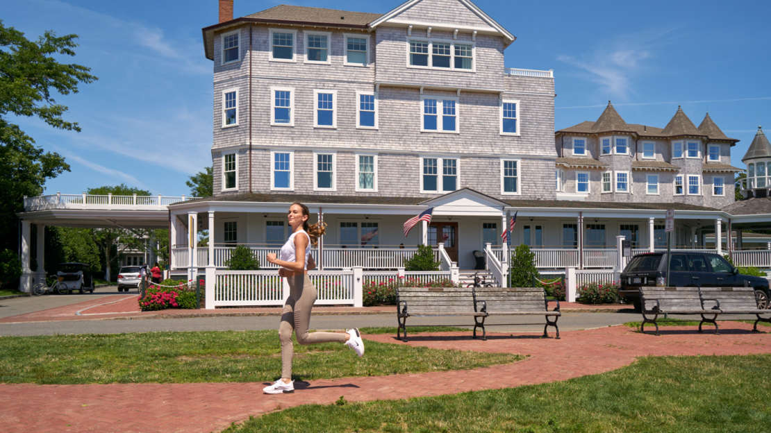 Woman running outside of the Harbor View Hotel