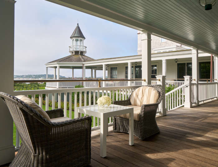 The seating on the Veranda at Harbor View Hotel with the gazebo in the background.