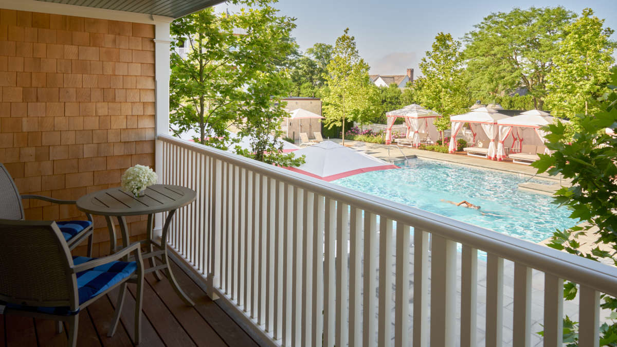 Roxana Room balcony overlooking the pool and cabanas.