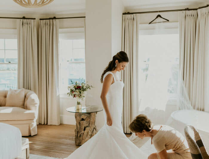 A bride with her bridesmaid in Skyhouse Master Bedroom.