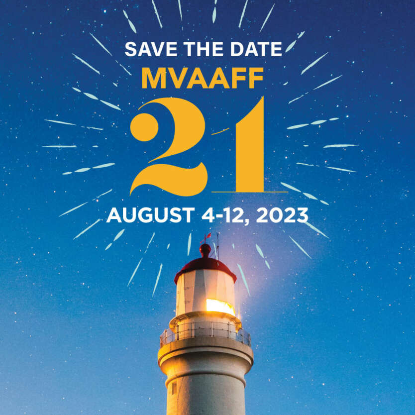 blue background with the words save the date MVAFF 21 August 4-12 2023 with a lighthouse