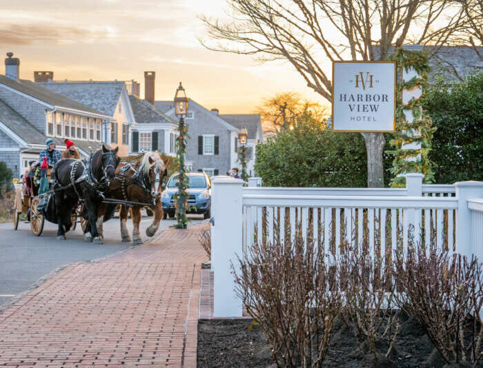 Sonnyride Horse Carriage Rides pulling up to the Harbor View Hotel on Martha's Vineyard in the winter.