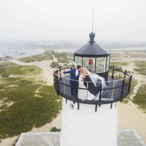 A kissing couple on top of the Edgartown Lighthouse on Martha's Vineyard.
