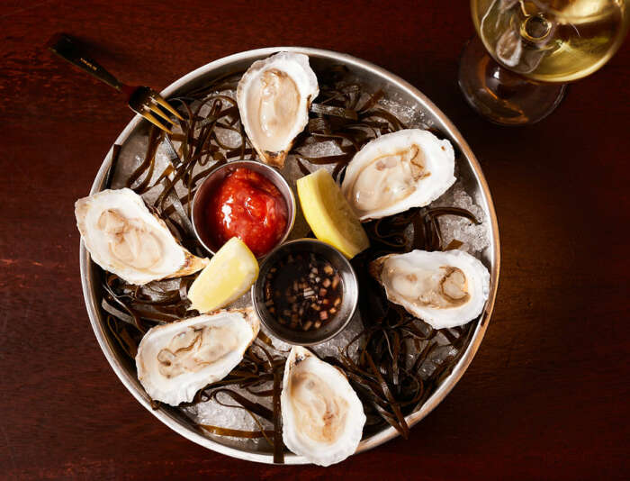 Six local Cottage City Oysters at the Bettini Restaurant on Martha's Vineyard.