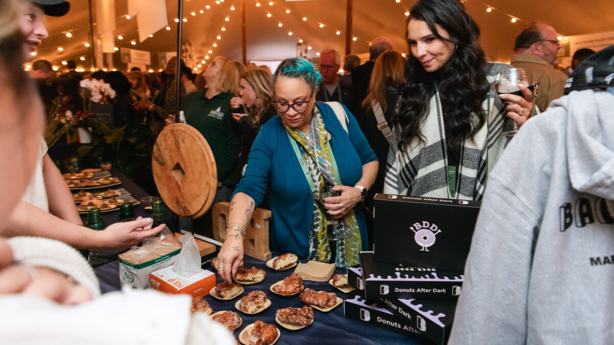 Guests tasting donuts at Harbor View Hotel during the 2023 Martha's Vineyard Food and Wine Festival.