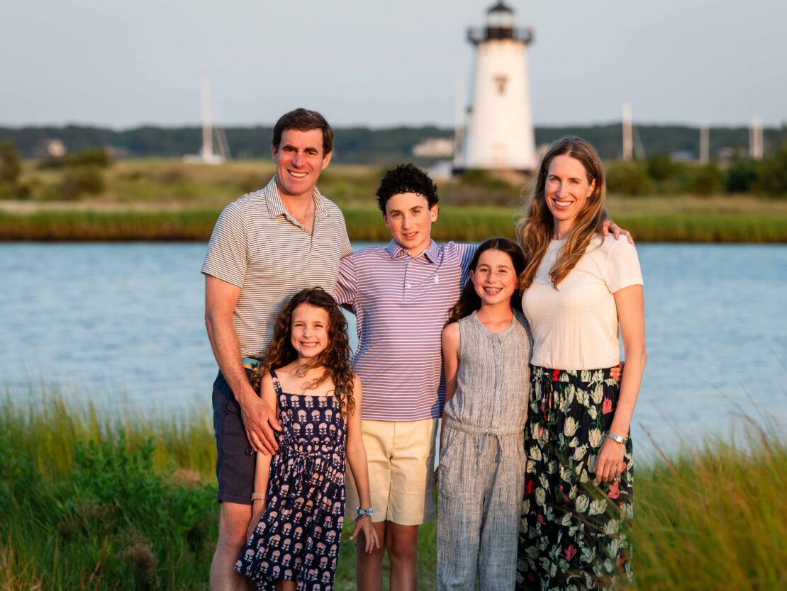 A family in front of the Edgartown Lighthouse.