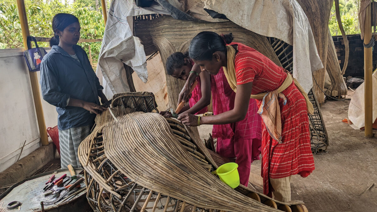 Women making an elephant sculpture.