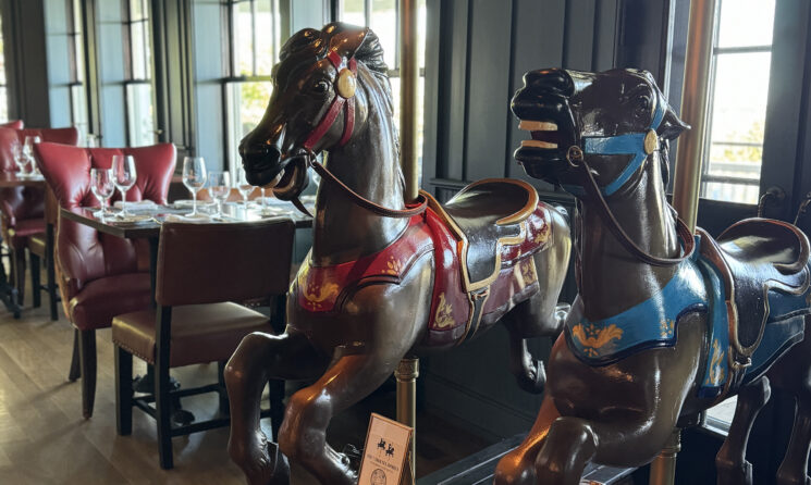 Horse carousels displayed in Bettini Restaurant.