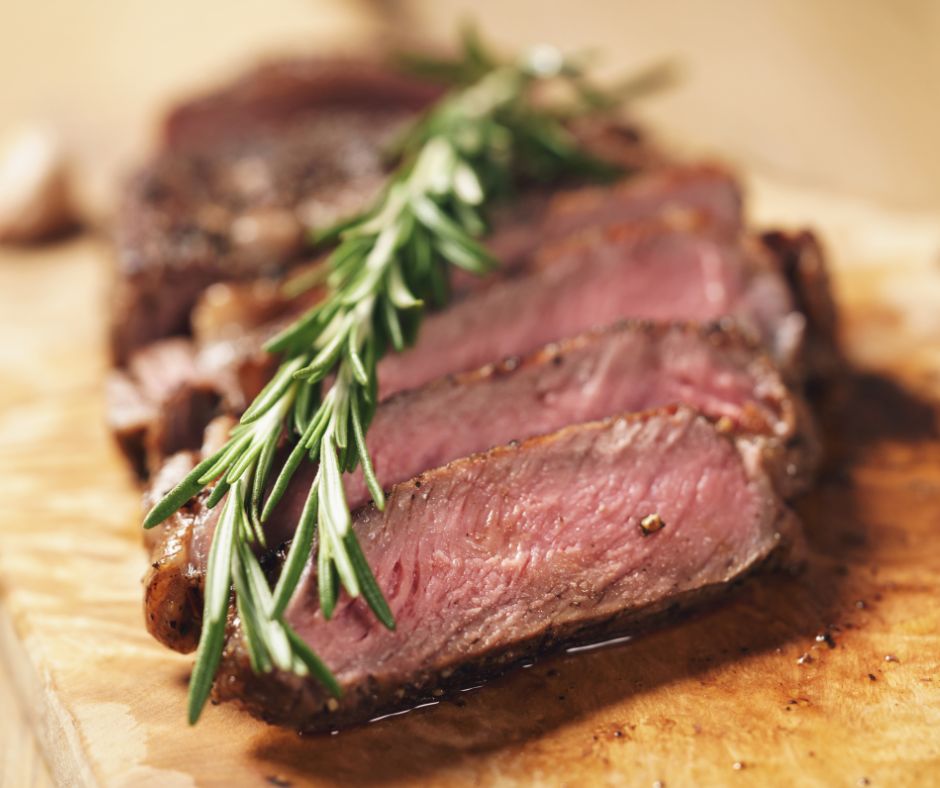 Prime Rib with a sprig of Rosemary