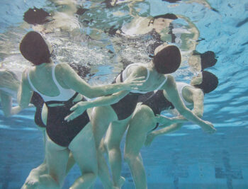 View of Aqualillies performers in the pool from under the water.