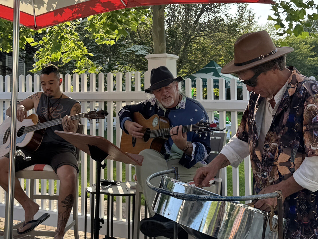 Rick Bausman and band playing music at Roxy Pool Bar.