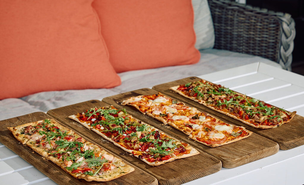 Four Flatbreads on the veranda at Harbor View Hotel.