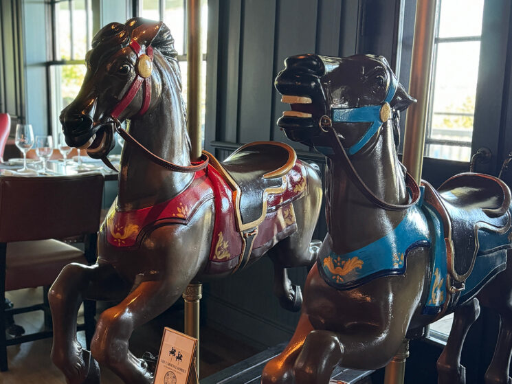 Horse carousels displayed in Bettini Restaurant.