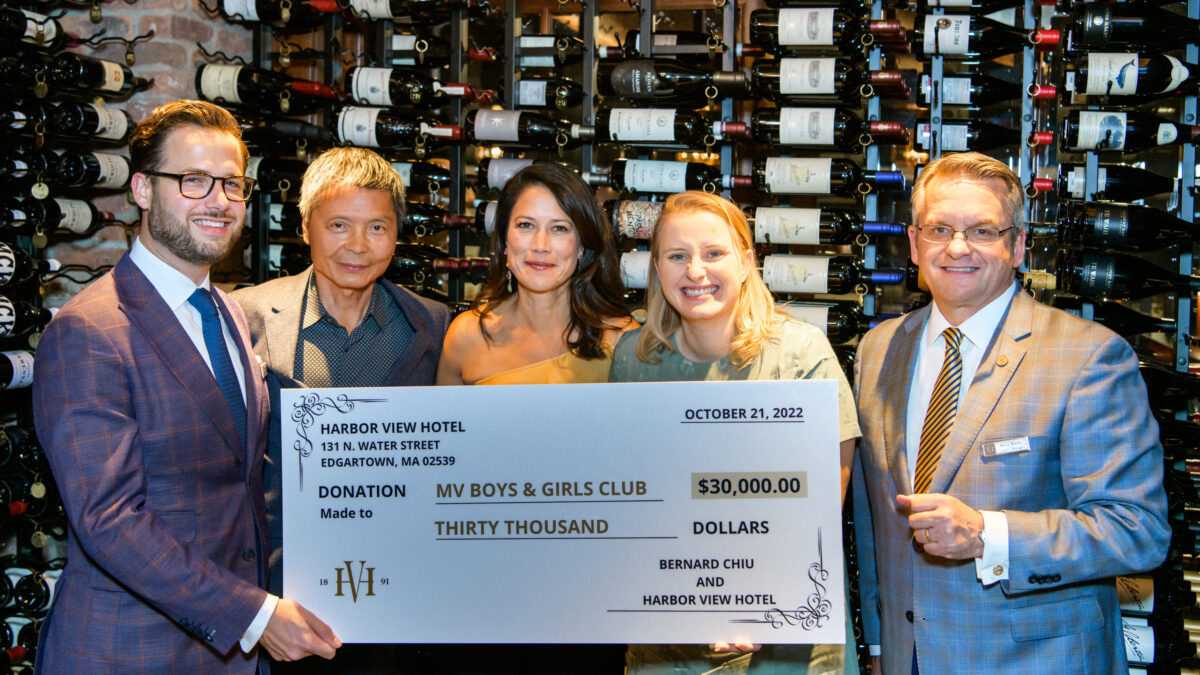 The Harbor View Hotel team holding a donation check for the Boys and Girls Club.