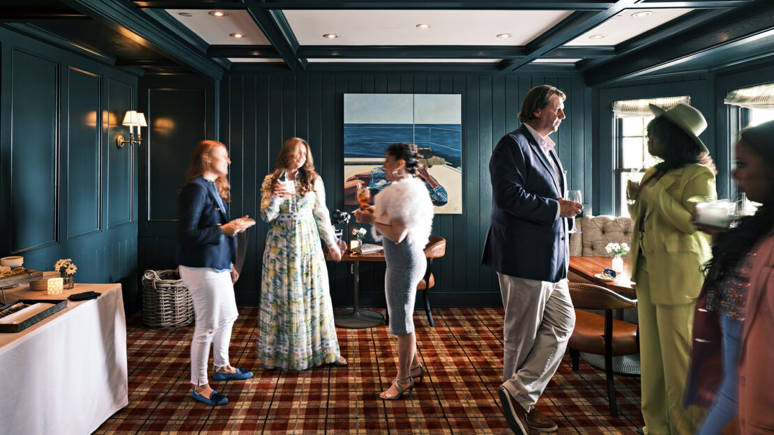 a small gathering of people in Behind the View on Martha's Vineyard.